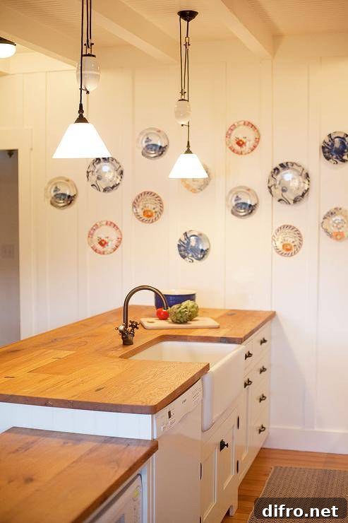 Playful plate arrangement in a cozy seaside cottage kitchen.