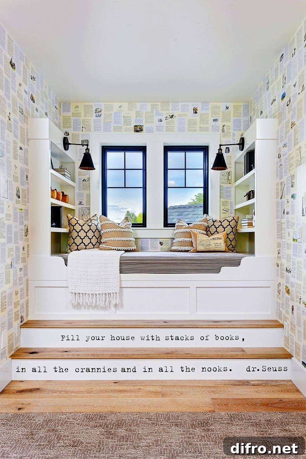 reading nook window seat with book wallpaper black windows and wall sconce lamps