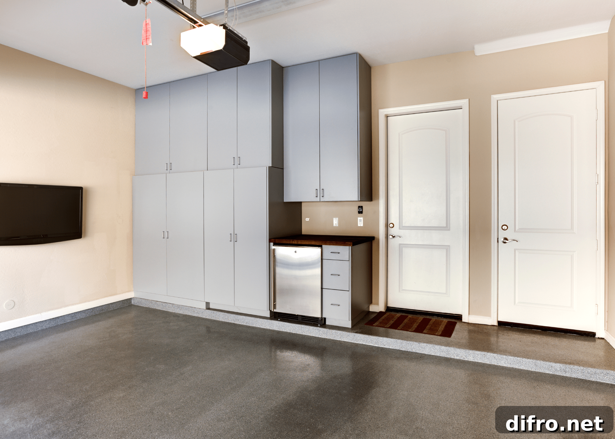 empty garage with grey cabinets.