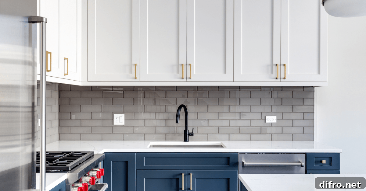A modern blue and white kitchen.