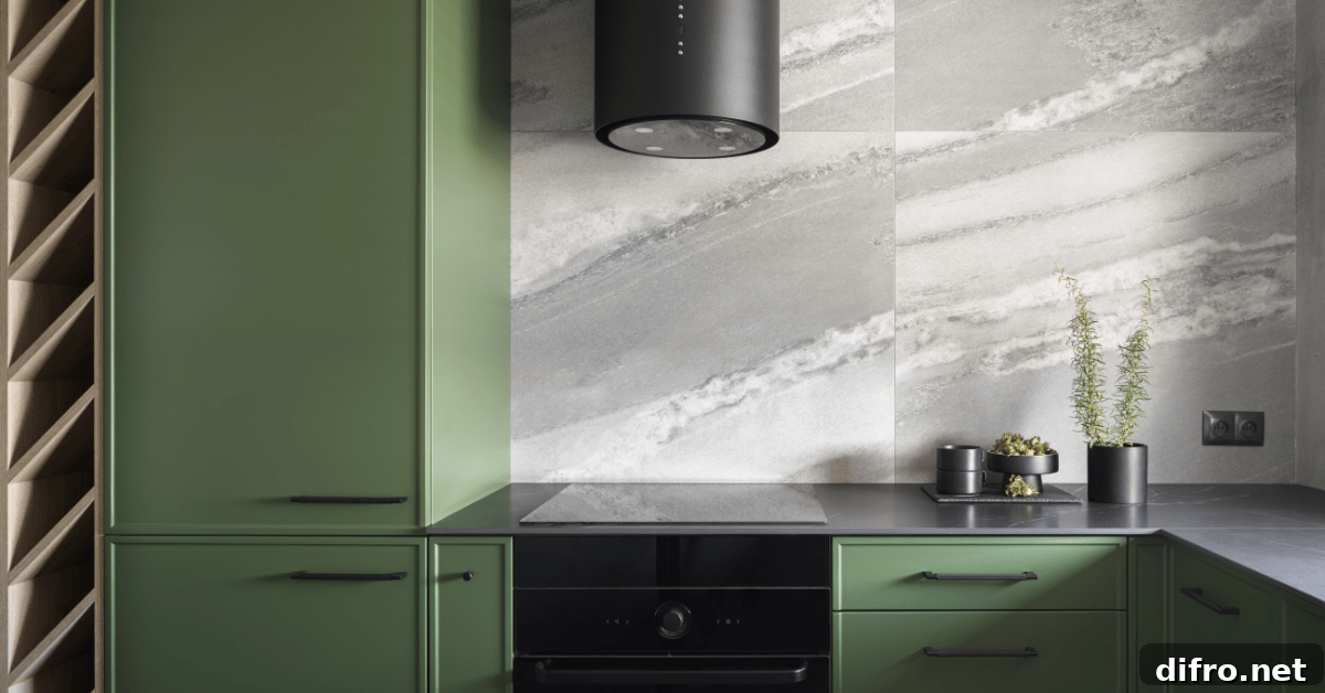 A modern green kitchen with black accents.