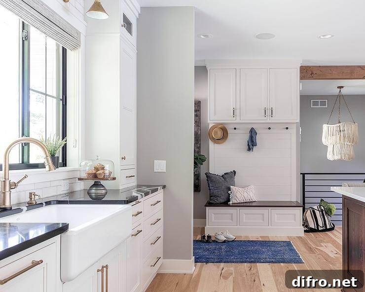 Mudroom bench with built-in cabinets and hooks