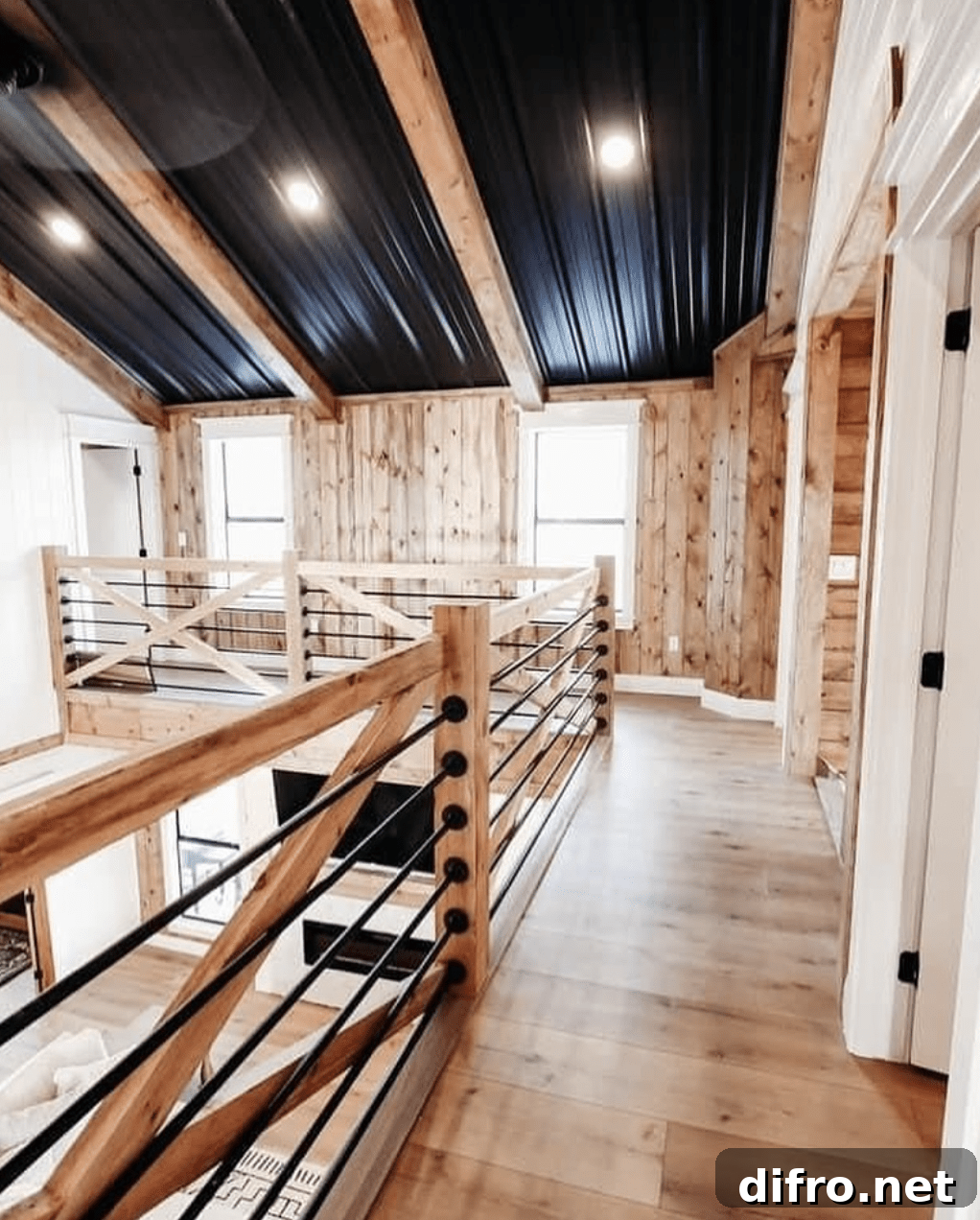 hallway in barndominium with black metal ceiling