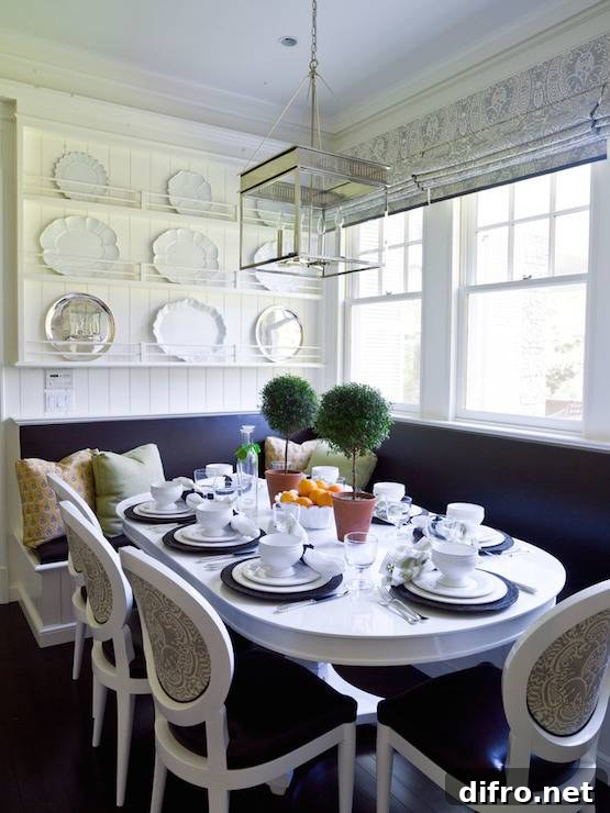 L-shaped window seat banquette with plate racks and tongue and groove paneled wall near windows.