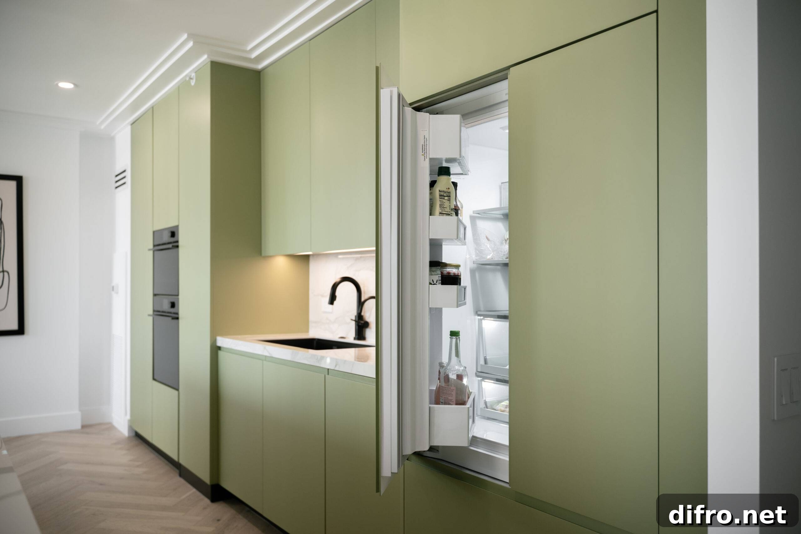 Hidden sage green cabinet fridge.