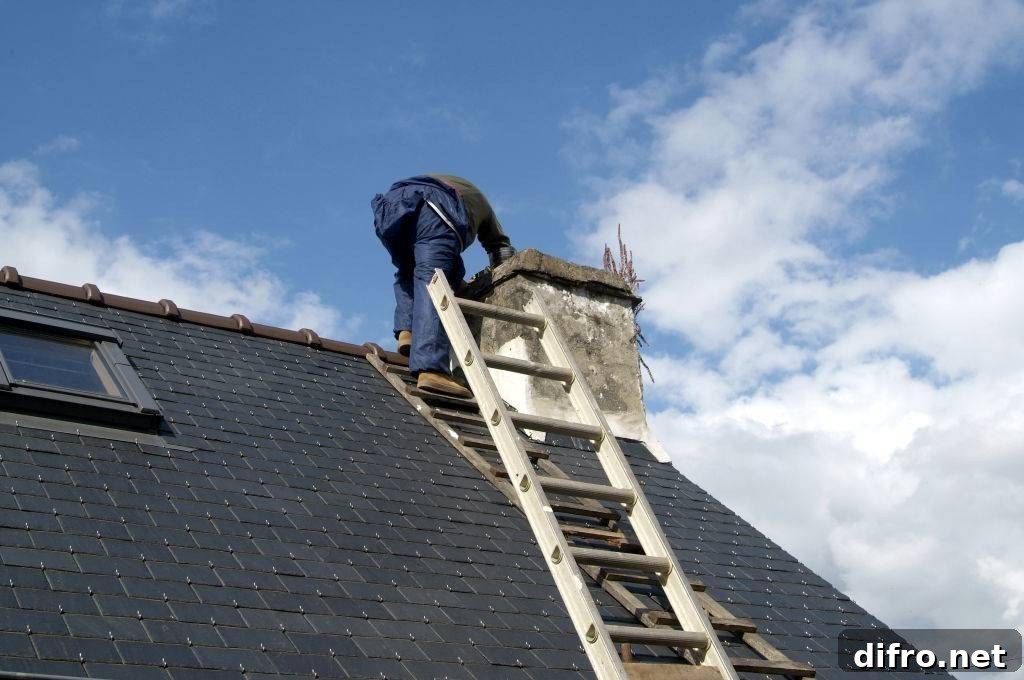 Man performing a chimney sweep