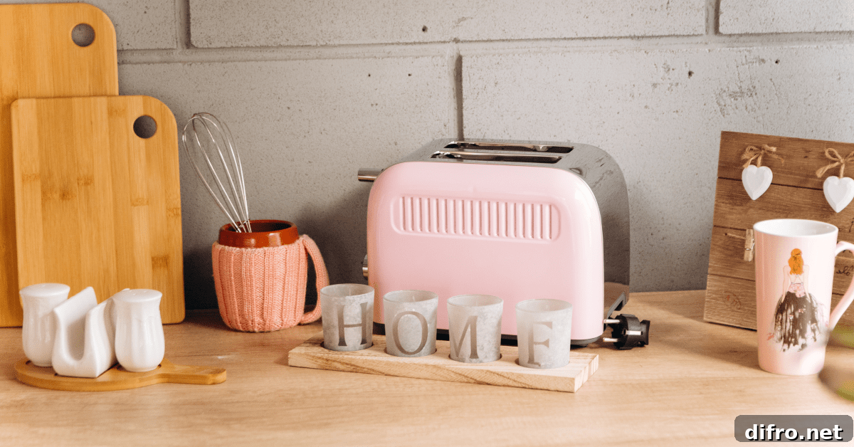 Pink toaster on a kitchen countertop.