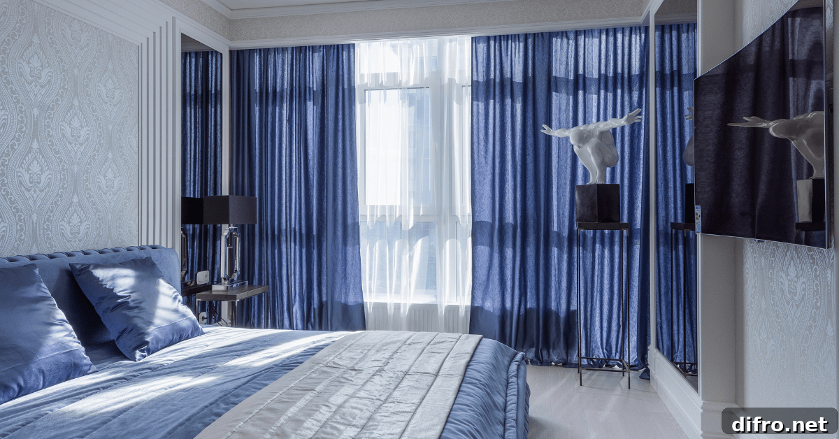 Blue bedroom with matching curtains.