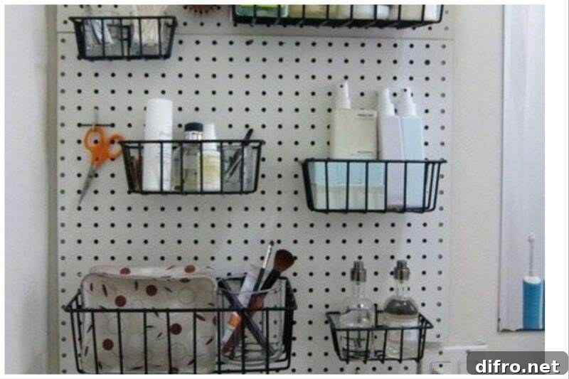 White pegboard with black baskets.