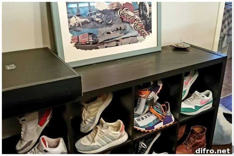 Shoe display in a cabinet.