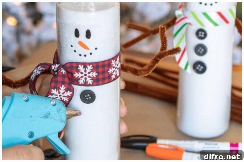 Snowman candles for Christmas centerpiece.