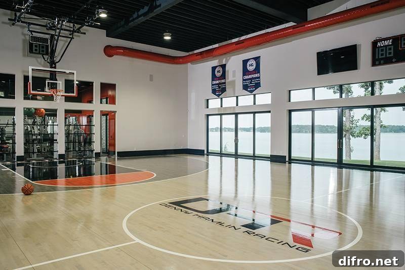 Basketball court inside of a mansion.