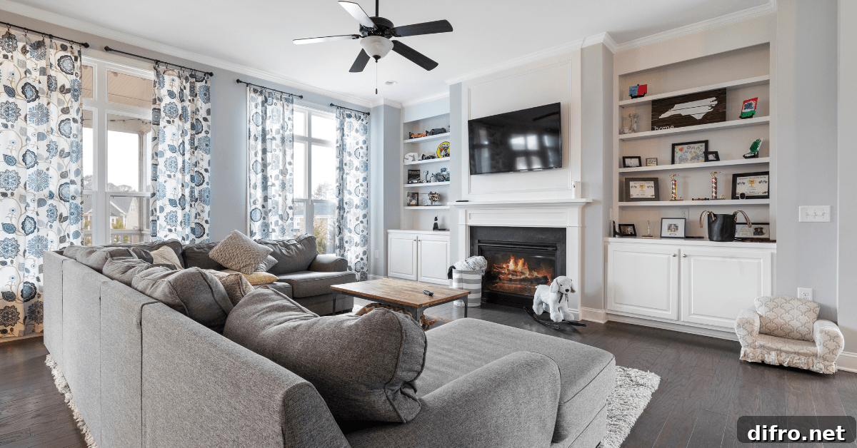 Living room with fireplace and bookshelves.