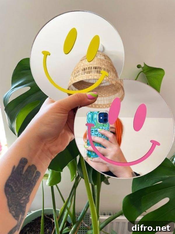 Small mirrors held up by someone's hand.