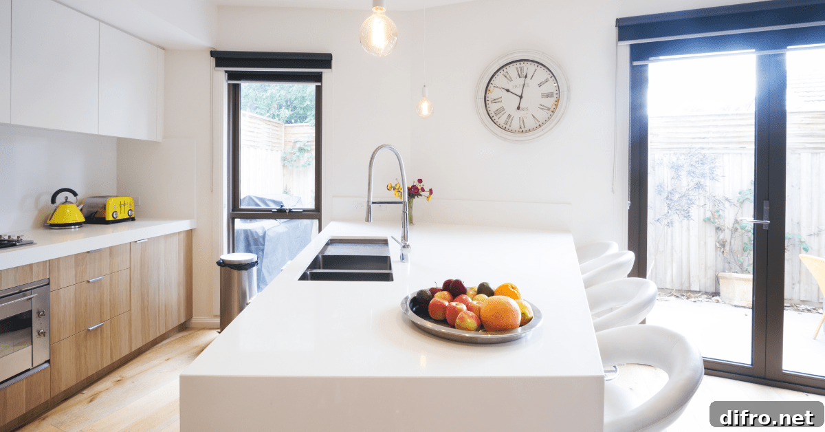 White kitchen with laminated cabinets.