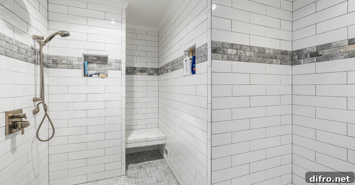 Shower with tile and grey grout.