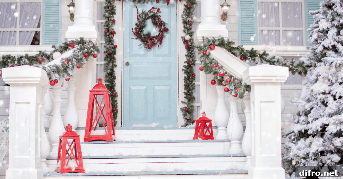 Snow covered front of a house with Christmas decoration.