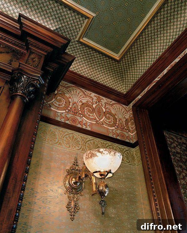 View looking up at the ceiling of a home, multiple wallpapers on the walls and ceiling.