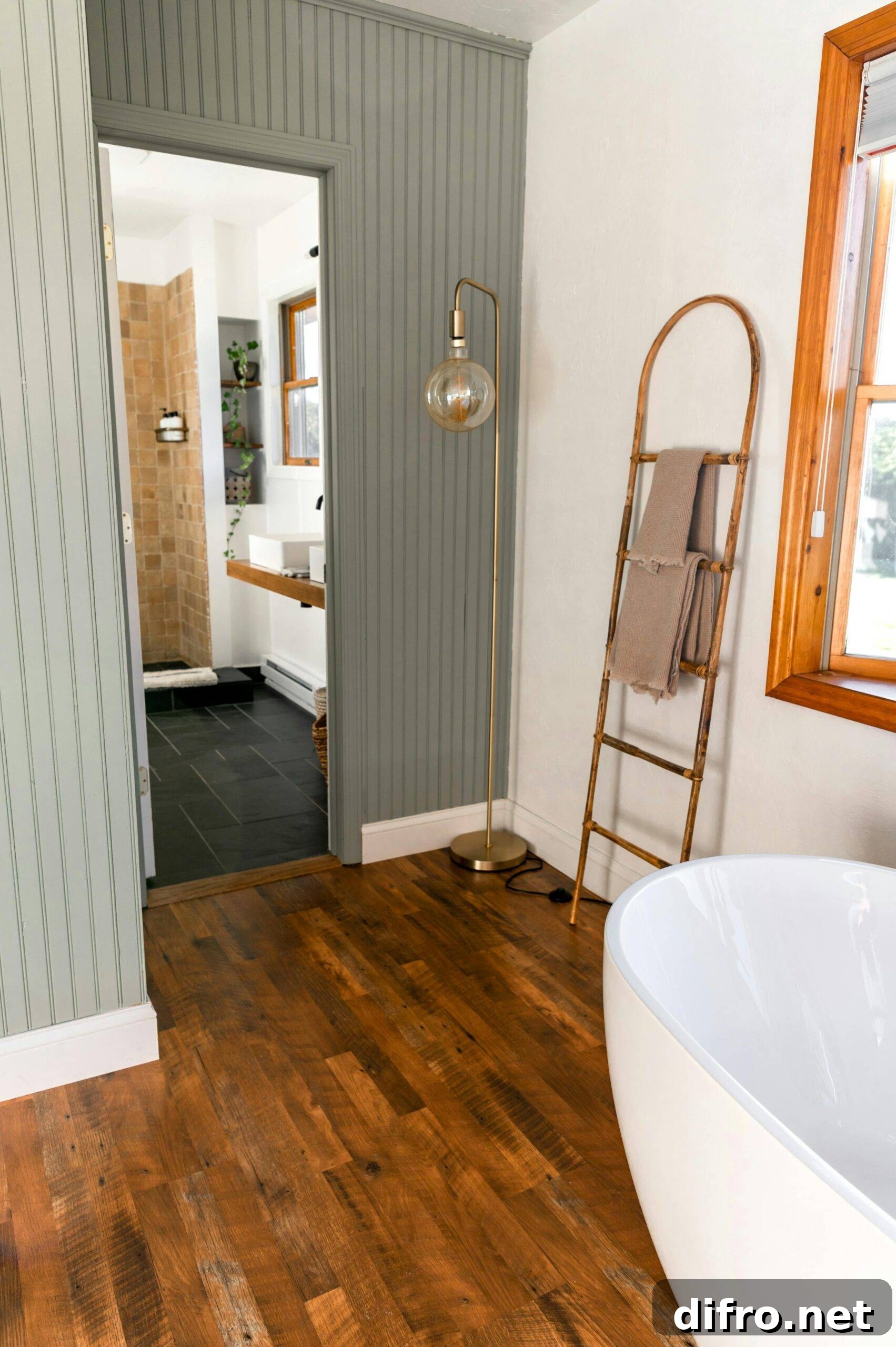 A bathroom, a towel ladder standing up against the wall.