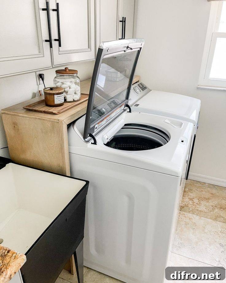 An open top-load washing machine.