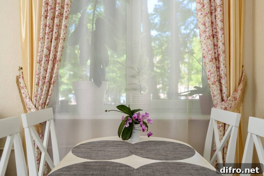 Dinning table at home with house plants and curtains