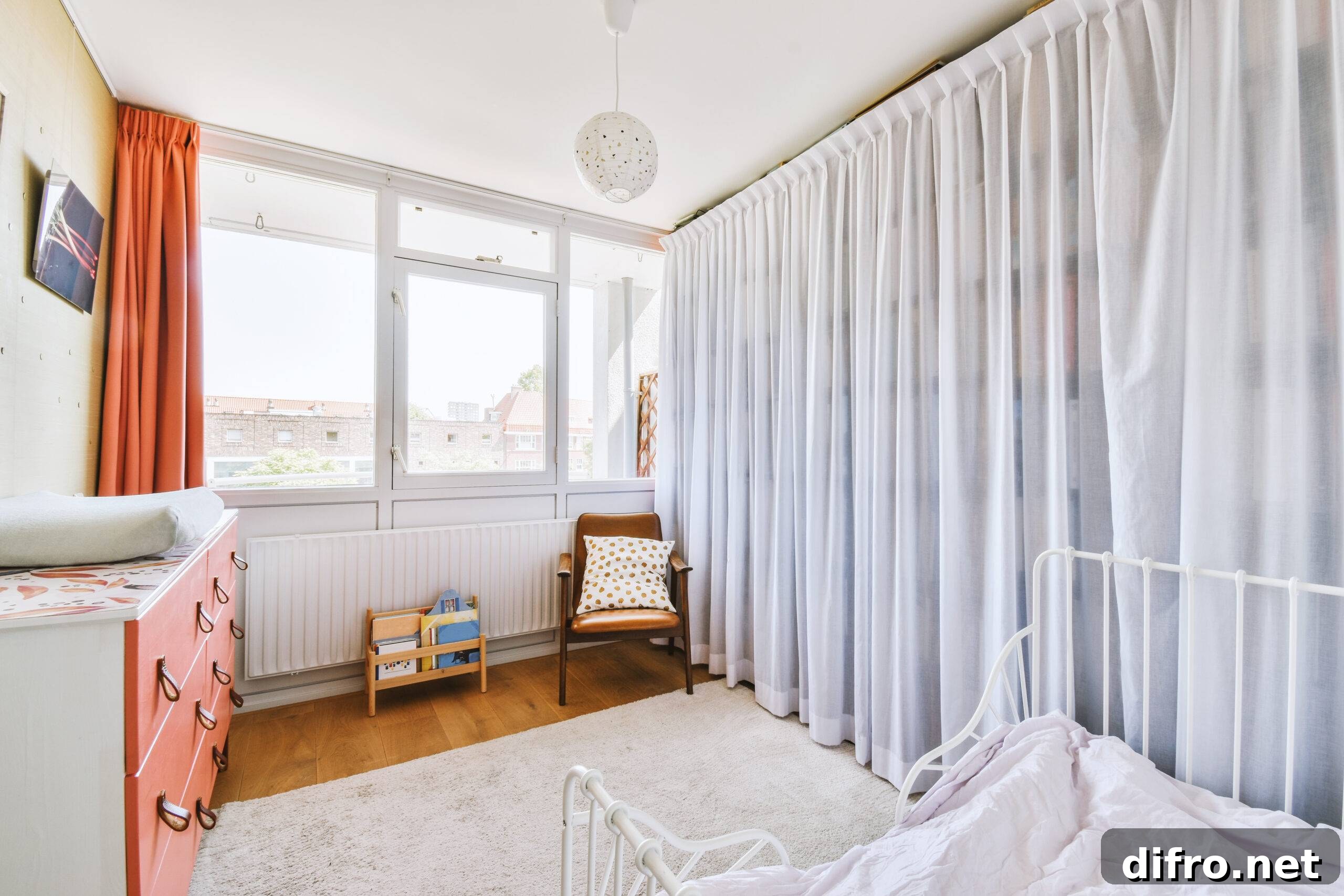 Home interior design of bedroom with bed and wooden wardrobe placed in corner near window in modern apartment
