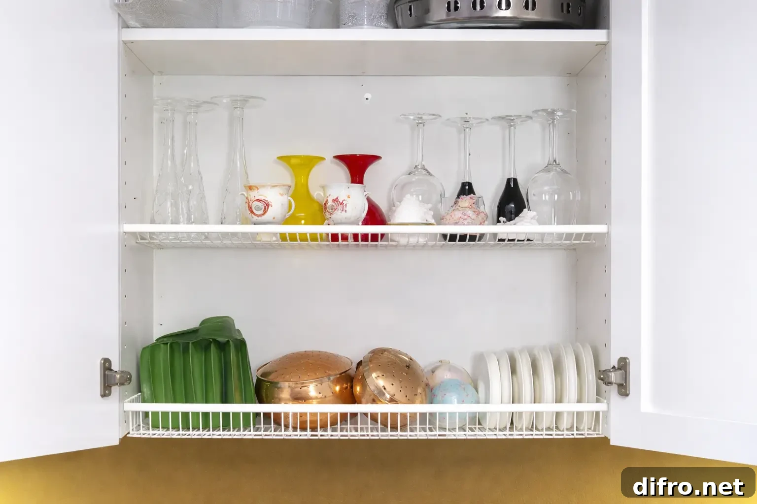 Finnish Dish Drying Cabinet: Martha Stewart's Space-Saving Tip 5 An image of a white Finnish dish drying rack 'astiankuivauskaappi' with white open doors