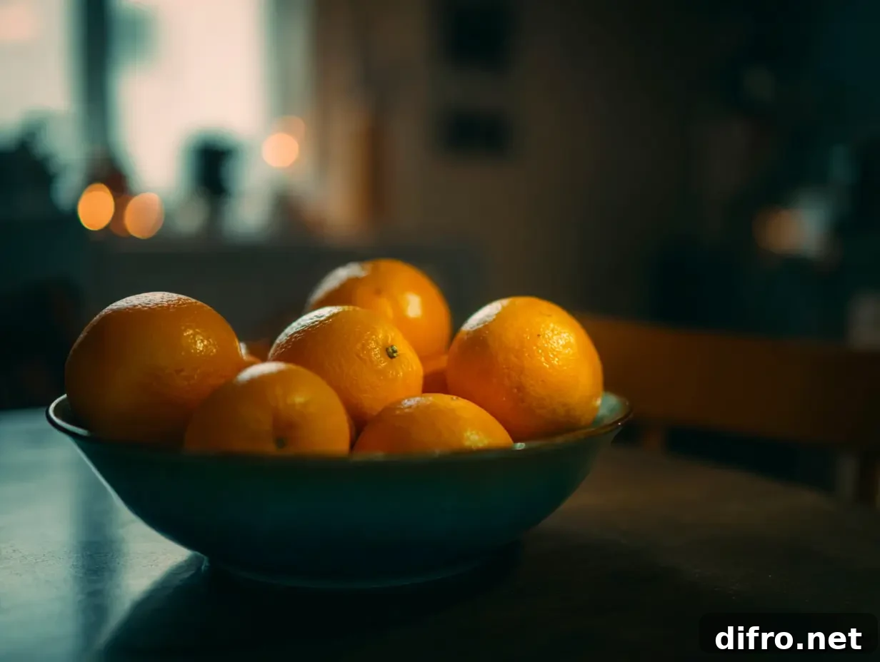 30-Minute Spring Cleaning Reset: Make Your Home Feel New 7 A shot of oranges kept on a table in someone's kitchen.