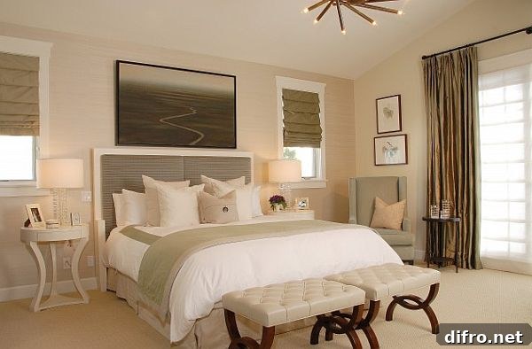 Modern Manhattan bedroom with grey headboard and down comforter