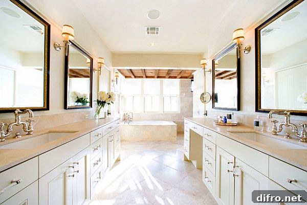 beautiful bathroom with his and hers sinks - vanities