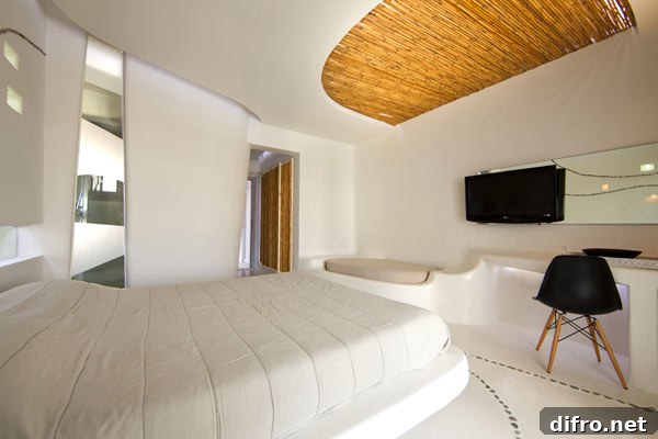 Minimalist white bedroom with floating bed design