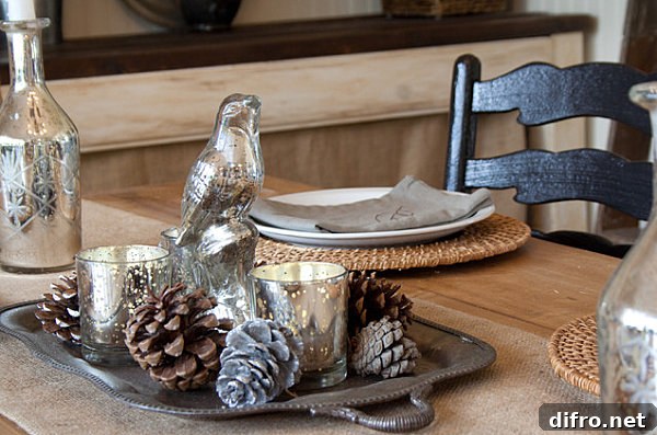 A pine cone and mercury glass Thanksgiving centerpiece
