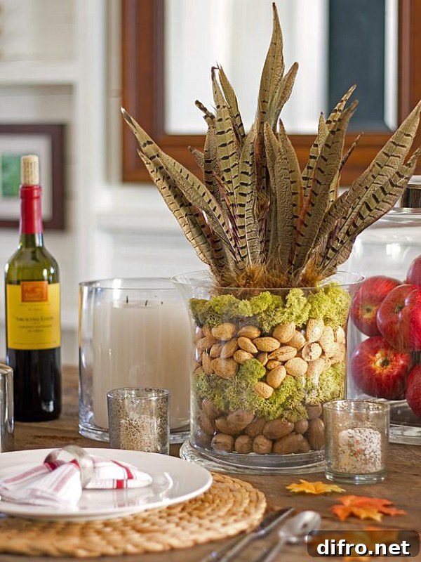 A Thanksgiving centerpiece made of nuts, feathers and moss
