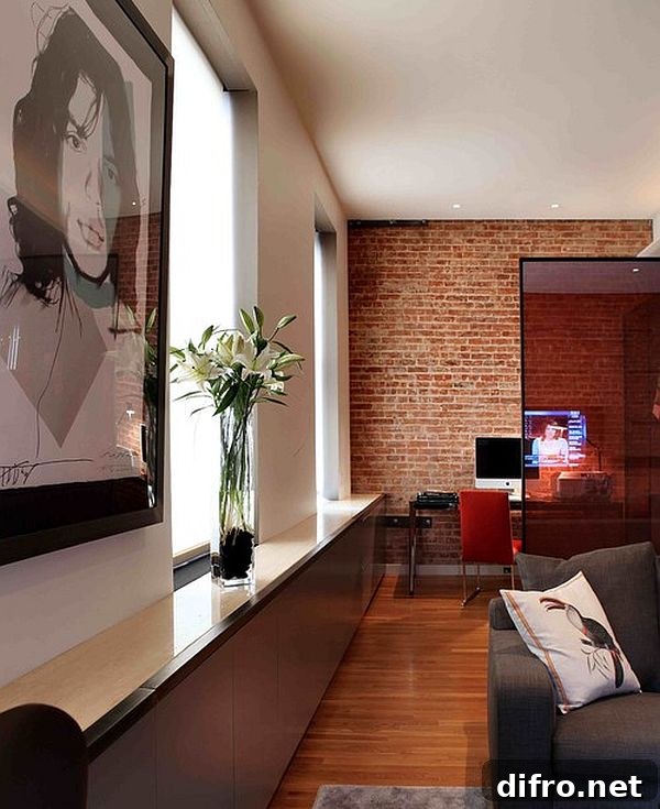 Living room home office space with brick wall