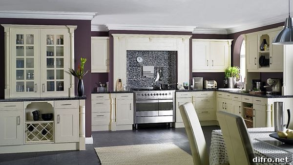 Purple kitchen walls go great with the white furniture