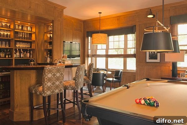 Home bar with a pool table and a relaxing feel