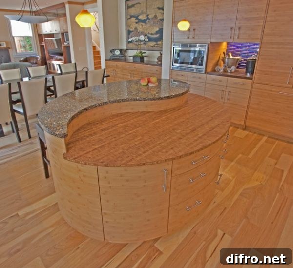 Contemporary Asian styled kitchen with a fabulous Yin-yang shaped island at its heart