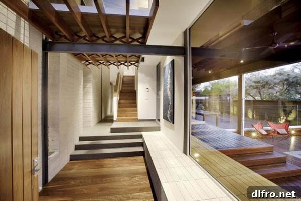 Cantilevered upper level and entrance of Coronet Grove house
