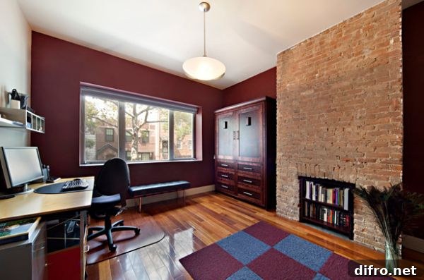 A simple bench next to the window takes over during the day