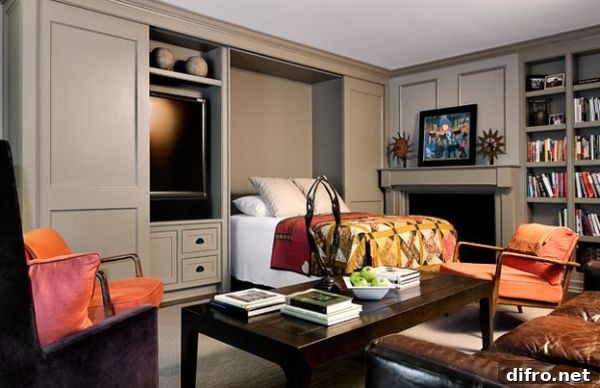 Out comes the hidden bed to transform the room