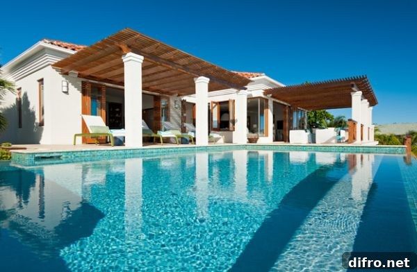 Structure of the home acts as support on one side of the pergola