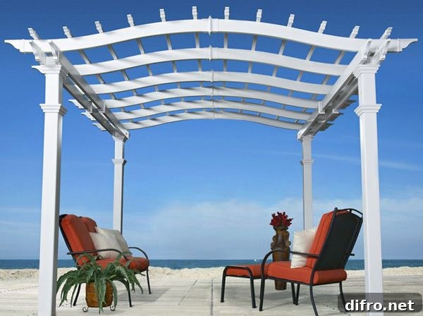Breezy vinyl pergola is a perfect match for homes with an ocean view!