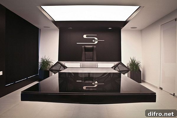 Meeting participants around the hybrid desk and conference table