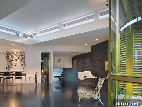 Dining area opening to the patio via a large pivoting door