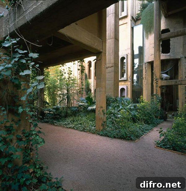 An interior courtyard framed by concrete arches