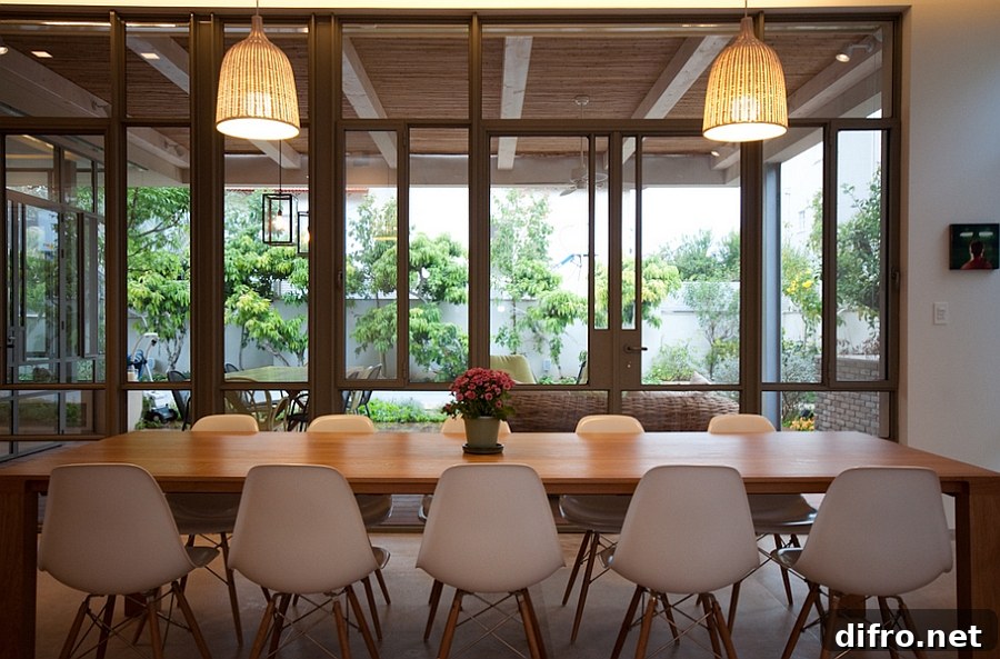 Large glass windows offer visual connectivity with the backyard
