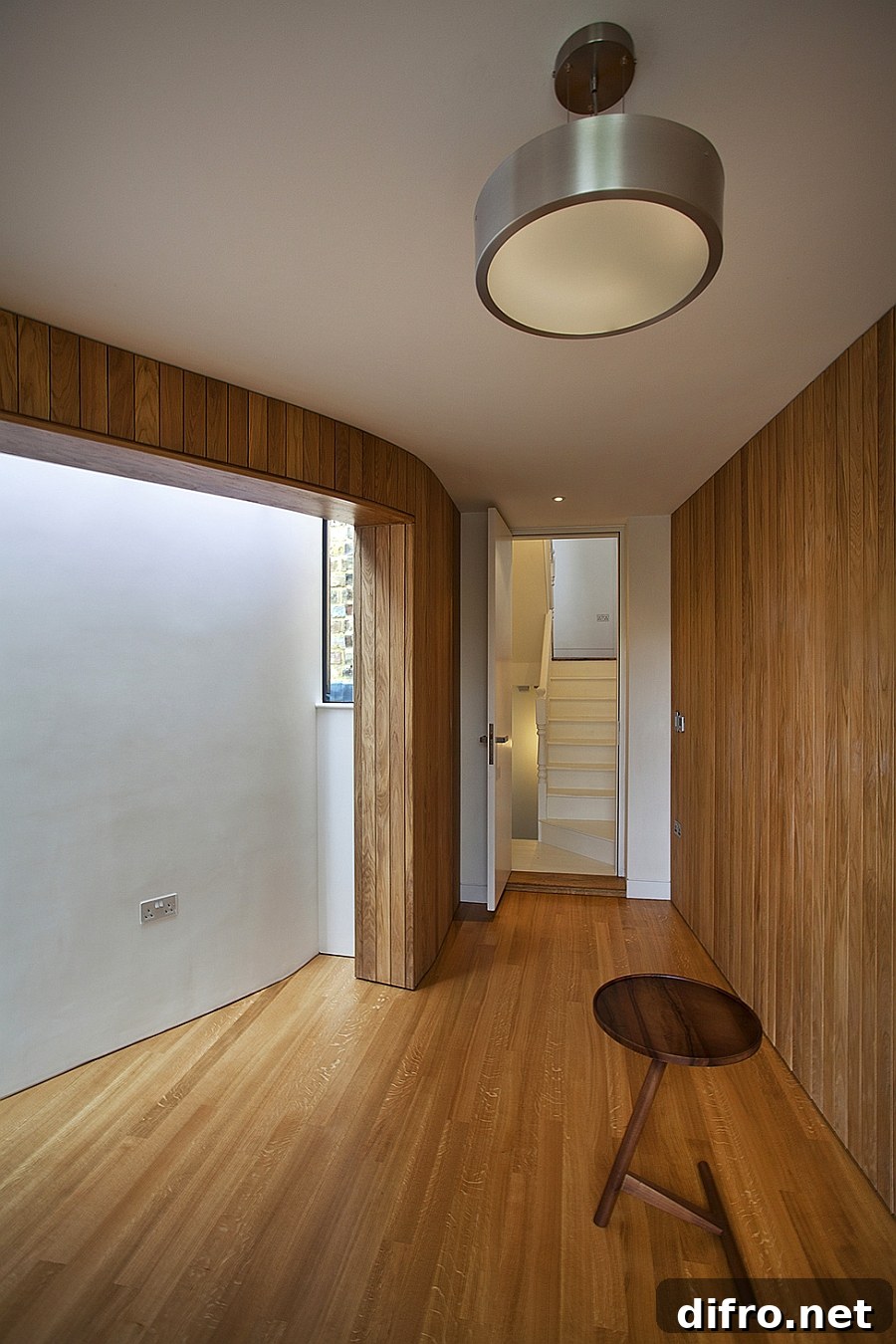 Timber clad surfaces add warmth to the London House