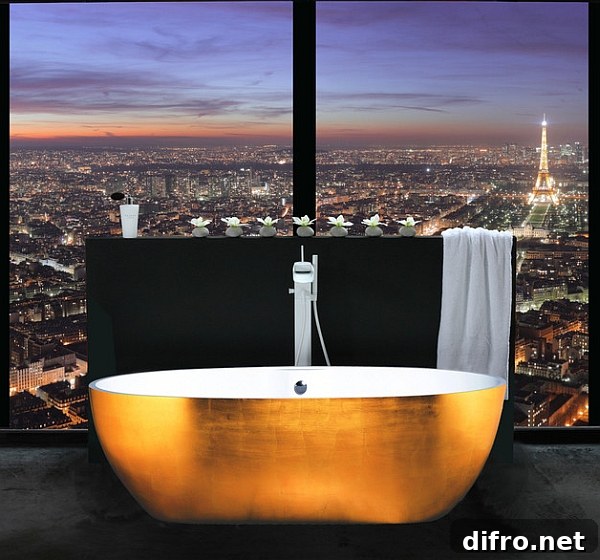 Gold leaf clad freestanding bathtub and a view to match its opulence!