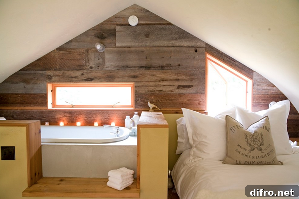 Cozy cabin bedroom with tub and candles