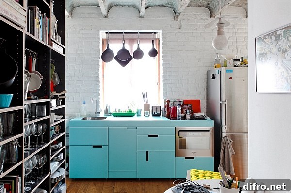 Robin's egg blue kitchen cabinets steal the show here